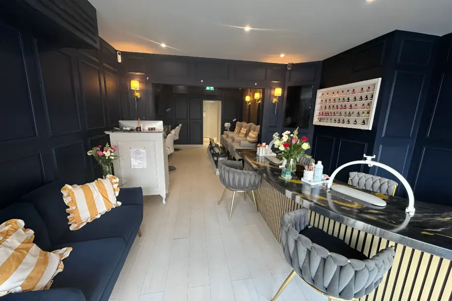 The lounge and reception, with a gold striped counter